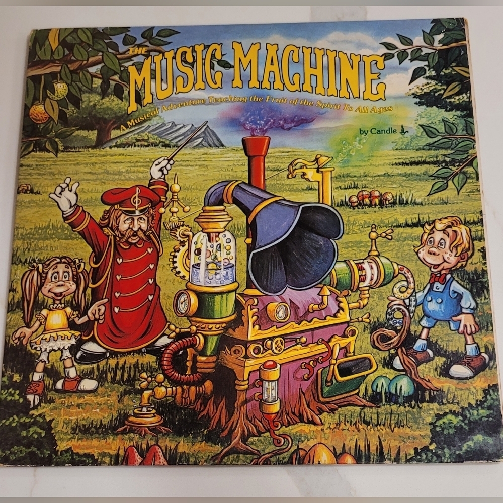 Music Machine vintage 1977 vinyl record and animated children's book.